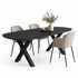 eettafel deens ovaal arc in de kleur black met een plant op de tafel