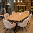 eettafel deens ovaal axis van bovenaf gezien in een showroom met 6 stoelen.