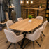 eettafel deens ovaal axis van bovenaf gezien in een showroom met 6 stoelen.