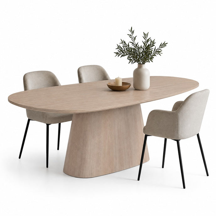 eettafel deens ovaal pivot behandeld met white waarbij je drie stoelen ziet staan.