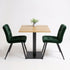 Horeca tafel bistro vierkant robuust eiken blad met zwart metalen onderstel en groene stoelen