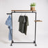 Houten kledingrek Levend van vurenhout met legplank in bruine wax en industrieel stalen frame