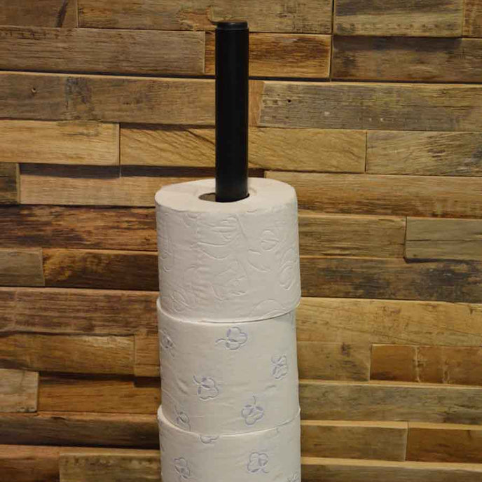 industriële wc rolhouder hangend aan de muur en met plek voor 4 wc rollen.