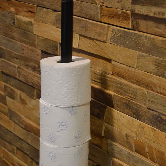 industriele wc rolhouder hangend aan de muur en met plek voor 4 wc rollen.
